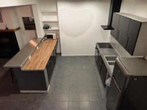 Kuchyň nebo kuchyňský kout v ubytování Charmante maison centre village