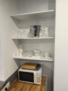 Kuchyň nebo kuchyňský kout v ubytování Charmante maison centre village