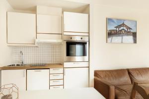 Køkken eller tekøkken på Elegant 1-Bed Apt in City Centre