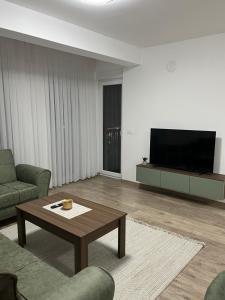 Et tv og/eller underholdning på Society Apartments