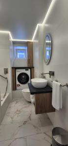 Et badeværelse på Afina center apartment