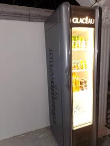 an open refrigerator with food inside of it at Cutting Edge Guest House in Daranka