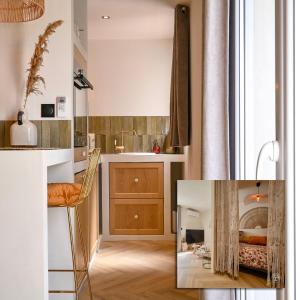 Kuchyň nebo kuchyňský kout v ubytování Une perle au bord de l'eau