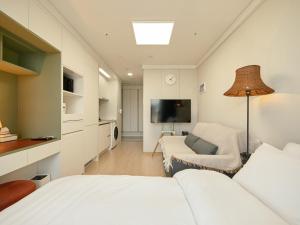 Et tv og/eller underholdning på Seoul COMOCASA Fully Furnished Studio