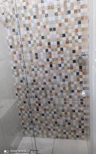 Koupelna v ubytování Pousada Quarto com frigobar,ar e garagem gratuita