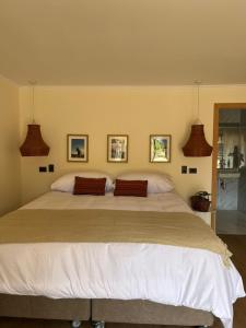 Giường trong phòng chung tại Uva Dulce B&B