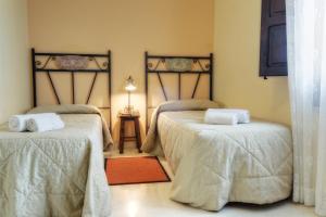 Postel nebo postele na pokoji v ubytování Agriturismo Vultaggio + 37 fotografií