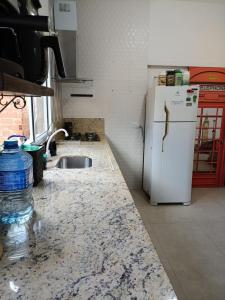 Kuchyň nebo kuchyňský kout v ubytování Casa Praia - Caraguatatuba e São Sebastião