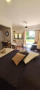 En eller flere senge i et værelse på Vieja Cepa Departamento