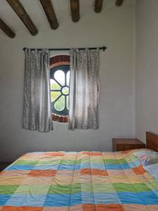 Postel nebo postele na pokoji v ubytování Teos Harmony Center