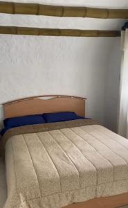 Postel nebo postele na pokoji v ubytování Teos Harmony Center