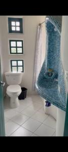 Koupelna v ubytování Teos Harmony Center