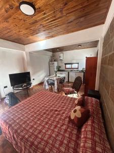 En eller flere senge i et værelse på Departamento cómodo