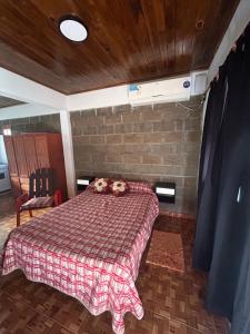 En eller flere senge i et værelse på Departamento cómodo