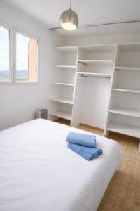 Postel nebo postele na pokoji v ubytování Appartement Vue mer La Croix Valmer