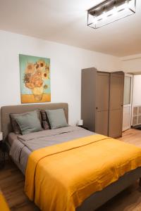 En eller flere senge i et værelse på Villa Szent Imre - Private Rooms