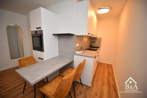 Η κουζίνα ή μικρή κουζίνα στο B & A Apartment mit Balkon