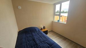 Ένα ή περισσότερα κρεβάτια σε δωμάτιο στο Volcan