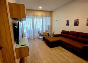 TV a/nebo společenská místnost v ubytování Oasis Turquesa Punta Cana Crystal Lagoon