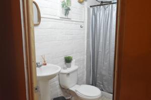 Et badeværelse på Hostal y Restaurante Chilltepe Ataco