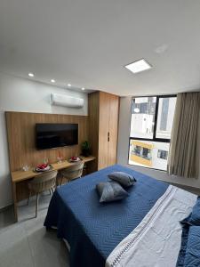 En eller flere senge i et værelse på Flat SOLAZ