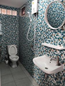 Et badeværelse på Airport Link Homestay