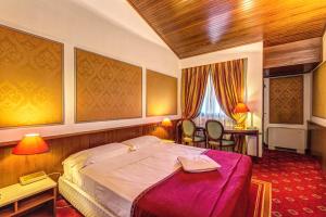 Cama o camas de una habitación en Hotel Motel Regal