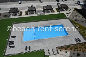 an overhead view of a swimming pool in a building at Beach Rent La Serena in La Serena