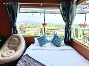 Ένα ή περισσότερα κρεβάτια σε δωμάτιο στο A La Mer Măng Đen