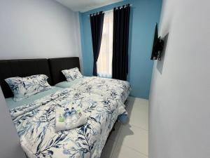 Ένα ή περισσότερα κρεβάτια σε δωμάτιο στο 3S Guest House