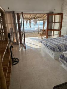 En eller flere senge i et værelse på Casa de playa San Marino Camana + 6 billeder