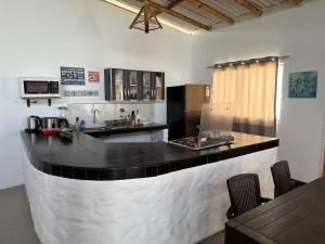 Køkken eller tekøkken på Casa de playa San Marino Camana