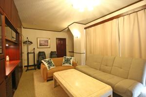 Posezení v ubytování ウェルカムイン湯本