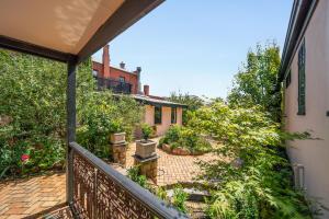 an outside view of a house with a balcony at The Globe in Castlemaine