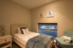 En eller flere senge i et værelse på The Views and Spa 4BRM