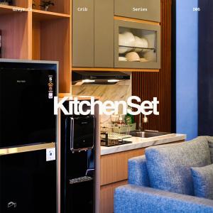 a kitchen with a kitchen set with a blue chair at GreysCo Villa Batu Panderman in Tlekung