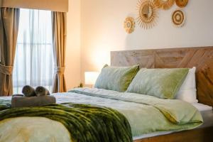 Postel nebo postele na pokoji v ubytování Seednest Gameroom &Green Oasis