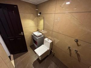 Koupelna v ubytování South Gate Residency + 44 fotografií
