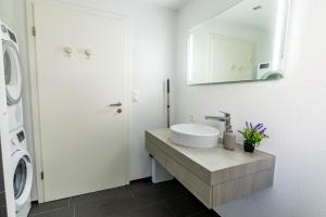 Et badeværelse på Jasminkas Host 3 - Stadtwohnung mit Küche & gratis Parkplatz + 53 billeder