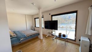 TV a/nebo společenská místnost v ubytování WildChild