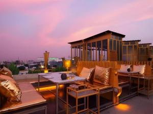 Posezení v ubytování Pak Ping Ing Tang Boutique Hotel