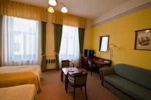 Postel nebo postele na pokoji v ubytování Grandhotel Garni