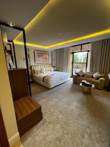 Postel nebo postele na pokoji v ubytování فندق شادن الفخامة