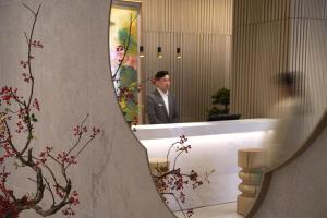 Gæster der bor på Stage Well Hotel