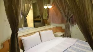 Letto o letti in una camera di Rido Hotel