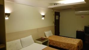 Letto o letti in una camera di Rido Hotel