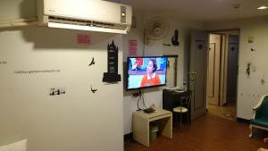 TV o dispositivi per l'intrattenimento presso Rido Hotel
