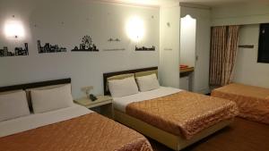 Letto o letti in una camera di Rido Hotel