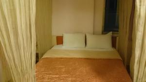 Letto o letti in una camera di Rido Hotel