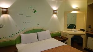 Letto o letti in una camera di Rido Hotel